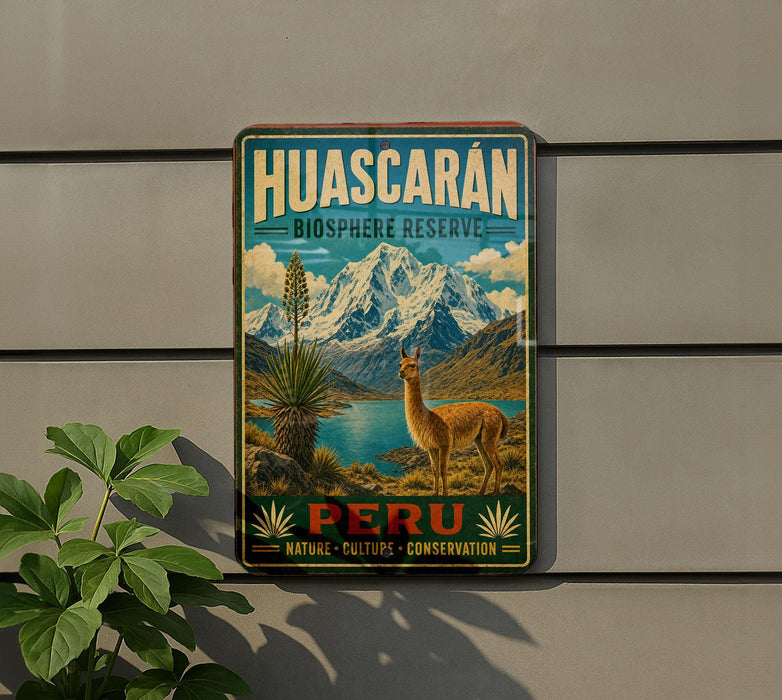 A vintage-style metal sign for Huascaran Biosphere Reserve in Peru, featuring a llama and a mountain landscape.