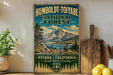A vintage-style poster advertising Humboldt-Toiyabe National Forest in Nevada, California, with a mountain landscape and pine trees.