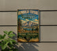 A vintage-style metal sign for the Humboldt-Toiyabe National Forest, featuring a mountain landscape and pine trees.