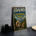 A vintage-style sign for the Idaho Centennial Trail, featuring a mountain landscape and the text "IDAHO CENTENNIAL TRAIL" prominently displayed.
