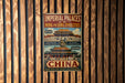 a vintage-style poster advertising the Imperial Palaces of the Ming and Qing Dynasties in Beijing, China.