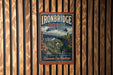 A vintage-style metal sign for Ironbridge Gorge, United Kingdom, featuring a bridge and a scenic landscape.