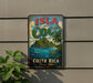 A vintage-style metal sign with the text "ISLA del COCO" and "Costa Rica Pure Vida" is displayed on a wall, with a plant to the left.