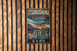 A vintage metal sign with the text "ItsukUSHIMA SHINTO SHRINE JAPAN" and an illustration of a traditional Japanese torii gate, which is a famous Shinto shrine located in Japan.