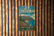 A vintage-style metal sign for J.T. Cheeseman Provincial Park, New Brunswick and Labrador, featuring a scenic mountain landscape.