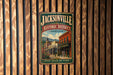 A vintage-style metal sign for the Jacksonville Historic District in Oregon, featuring an illustration of a historic building and the text "Step back in time".