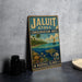 A vintage metal sign for the Jaluit Atoll Conservation Area, featuring a tropical beach scene with palm trees, a boat, and a turtle.