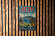 A vintage-style metal sign for Jeju Island Park, Republic of Korea, featuring a scenic landscape with mountains, a statue, and orange flowers.