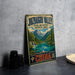 A vintage-style metal sign for the Juzhailou Valley in China, featuring a scenic landscape with mountains, waterfalls, and a lake.