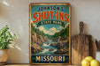 A vintage-style sign for Johnson's Shut-Ins State Park in Missouri, featuring a scenic illustration of a river and mountains.