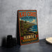 A vintage-style sign advertising the Kau Coast Cultural Landscape in Hawaii, featuring a tiki statue and a tropical landscape.