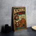 A vintage-style metal sign for the Kachina Trail in Arizona, featuring an illustration of a Native American figure and the text "Kachina Trail" and "Discover the Spirit of Arizona".