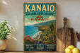 A vintage-style sign for the Kanio Natural Area Reserve in Hawaii, featuring a scenic landscape with mountains, palm trees, and the ocean.