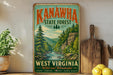 A vintage-style sign for Kanawha State Forest in West Virginia, featuring a scenic mountain landscape with a river and pine trees.