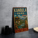 A vintage-style metal sign for Kanbula Park, China, featuring a scenic illustration of a temple, mountains, and a river.