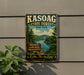 A vintage-style metal sign for the Kasoag State Forest in New York, featuring a scenic landscape with pine trees, a lake, and mountains.