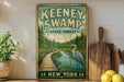 A vintage-style sign for Keeney Swamp State Forest in New York, featuring a wooden boardwalk leading to a pond with a heron.