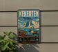 A vintage-style metal sign for Kekerten Territorial Park, Nunavut, featuring a reindeer and a mountainous landscape.