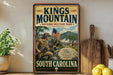 A vintage-style poster advertising Kings Mountain National Military Park in South Carolina, featuring a soldier with an American flag and a historical battle scene.