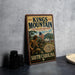 A vintage metal sign for Kings Mountain National Military Park, featuring an illustration of a soldier and a battle scene, with the text "Kings Mountain National Military Park" and "South Carolina" prominently displayed.