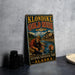 A vintage-style metal sign for Klondike Gold Rush National Historical Park in Alaska, featuring an illustration of a man panning for gold.