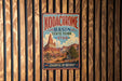 A vintage-style metal sign for Kodachrome Basin State Park in Utah, featuring a scenic image of the park's natural landscape.