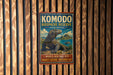 A vintage-style metal sign for Komodo Island, Indonesia, featuring a large Komodo dragon and the text "Komodo Island" and "World Heritage Site - Protect Nature, Preserve Life".