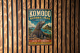 A vintage-style metal sign for Komodo National Park in Indonesia, featuring an illustration of a Komodo dragon.