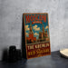 A vintage-style metal sign displaying the text "MOSCOW RUSSIA THE KREMLIN AND RED SQUARE" with an illustration of the Kremlin and St. Basil's Cathedral in Moscow, Russia.