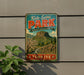 A vintage-style metal sign with the text "Kula-Sahlili Park" and "Türkîye" is displayed on a wall, with a plant to the left.