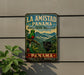 A vintage-style sign for the La Amistad Panama Biosphere Reserve, featuring a colorful illustration of a bird and a black panther in a lush, tropical setting.