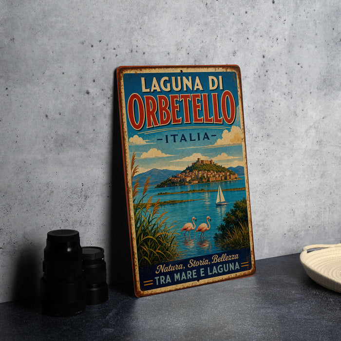 A vintage-style metal sign for the Laguna di Orbetello in Italy, featuring a scenic landscape with a castle, boats, and flamingos.