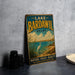 A vintage-style sign for Lake Bardawil in Egypt, featuring a seagull and a scenic landscape.