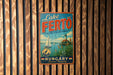 A vintage-style metal sign with the text "Lake Fertö" and "The Jewel of Western Hungary" is displayed on a wooden wall.