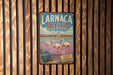 A vintage-style metal sign for Larnaca Salt Lake, Cyprus, featuring a scenic image of flamingos in the water.