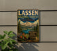 A vintage-style metal sign for the Lassen National Forest in California, featuring a scenic mountain landscape with pine trees, a lake, and wildflowers.