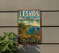 A vintage-style metal sign for "Lesvos Island Park" in Greece, featuring an owl perched on a cliff overlooking the sea.