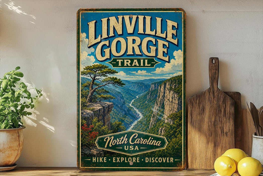 A vintage-style sign for Linville Gorge Trail, featuring a scenic mountain landscape with a winding river, surrounded by lush greenery.