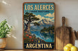A vintage-style poster of Los Alerces, a national park in Argentina, featuring a scenic landscape with a lake, mountains, and trees.