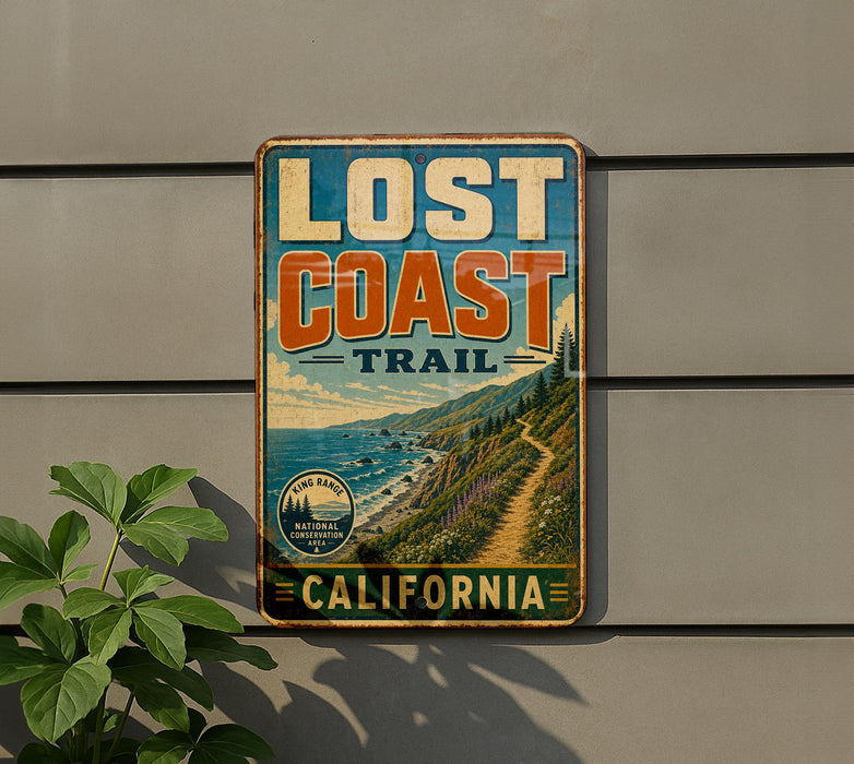 a vintage-style metal sign that reads "Lost Coast Trail" and "California", mounted on a wall.
