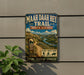 a vintage trail sign for the Maah Daha Heh Trail in North Dakota, with a scenic mountain landscape and a path leading through the area.