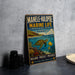 A vintage metal sign advertising the Manole-Hulopoe Marine Life Conservation District in Hawaii, featuring a colorful illustration of a sea turtle and coral reef.