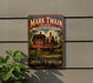 A vintage-style metal sign for the Mark Twain House in Hartford, Connecticut, featuring an illustration of the house and the text "The Home of America's Greatest Storyteller".