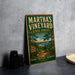 A vintage-style metal sign for Martha's Vineyard State Forest in Massachusetts, featuring a scenic illustration of pine trees and a path leading to a body of water.