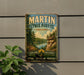 A vintage-style sign for Martin State Forest in Indiana, featuring a scenic landscape with a lake and forest.