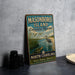A vintage-style metal sign for Masonboro Island Estuarine Reserve in North Carolina, featuring an illustration of a bird and a turtle in a grassy area with water.