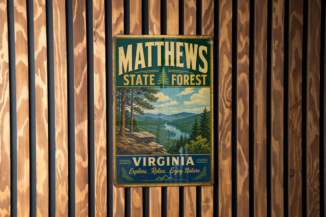 A vintage metal sign for Matthews State Forest in Virginia, featuring a scenic landscape with pine trees and a river.