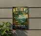 A vintage metal sign for Matthews State Forest in Virginia, featuring a scenic landscape with pine trees and a river.