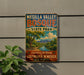 A vintage-style metal sign for Mesilla Valley Bosque State Park in Southern New Mexico, featuring a scenic landscape with a river and mountains.