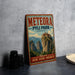 A vintage-style metal sign for Meteora, Pyli Park, Greece, featuring a mountain landscape with a castle-like structure.